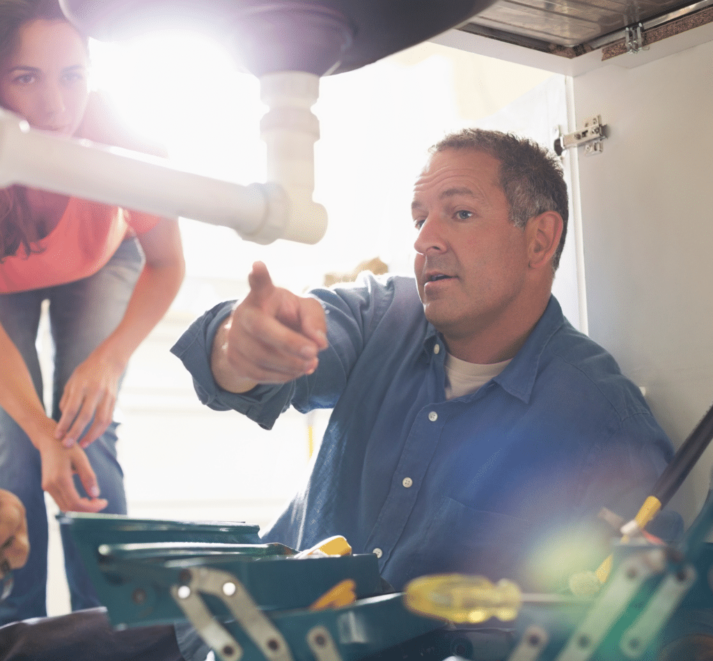 Plumber Looking Under Sink Austin TX